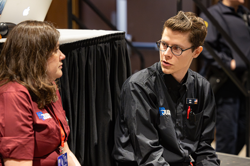 Amanda and Ryan chat at the stage between rounds at the Hunter Burton Memorial Open in 2024. Photo © John Brian McCarthy