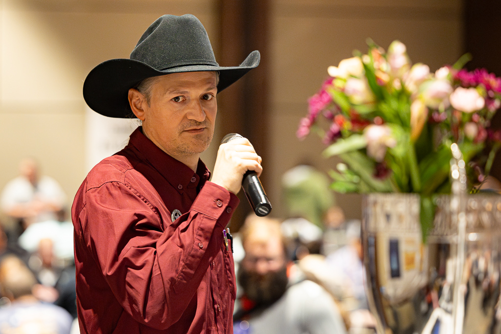 David makes announcements at the Hunter Burton Memorial Open in 2024. Photo © John Brian McCarthy